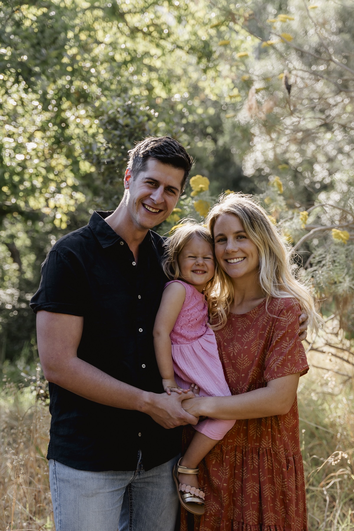 Matt Budden with Anne and their daughter in a family portrait